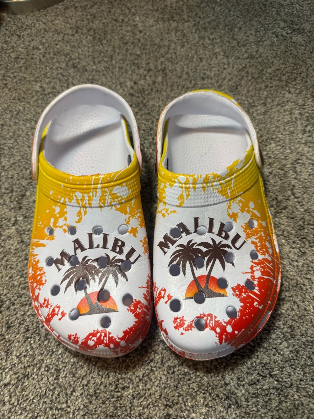 Malibu Graphic Slip-On Clogs in Yellow & Orange